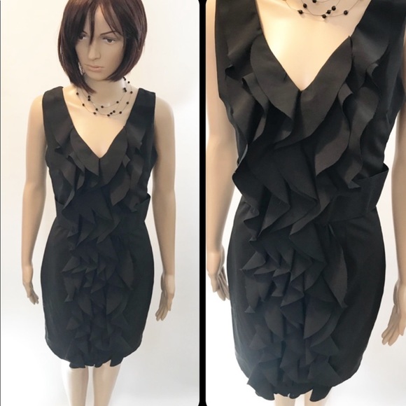 black dress with ruffles in front